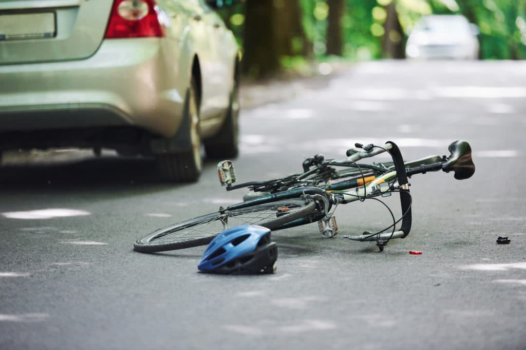 A bicycle lying on the Street
